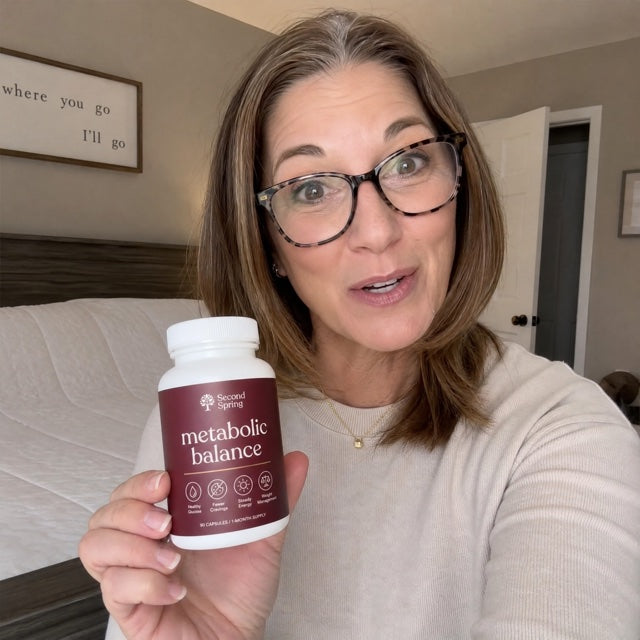 Woman holding Second Spring Metabolic Balance