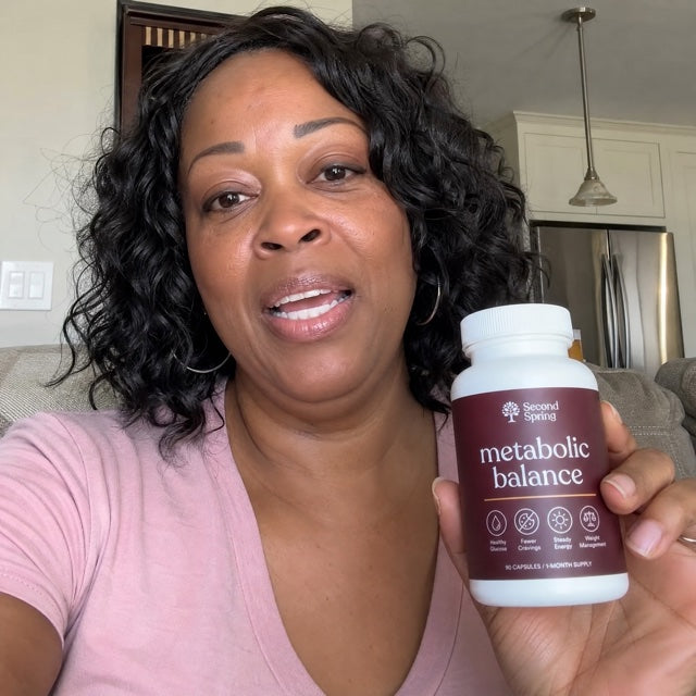 Woman holding Second Spring Metabolic Balance